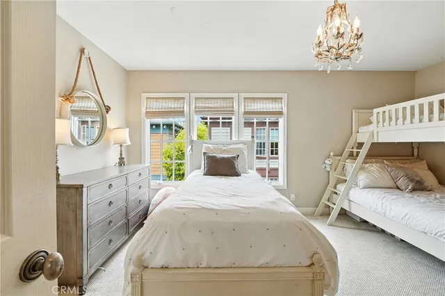a bathroom with a granite countertop sink a large mirror and a shower