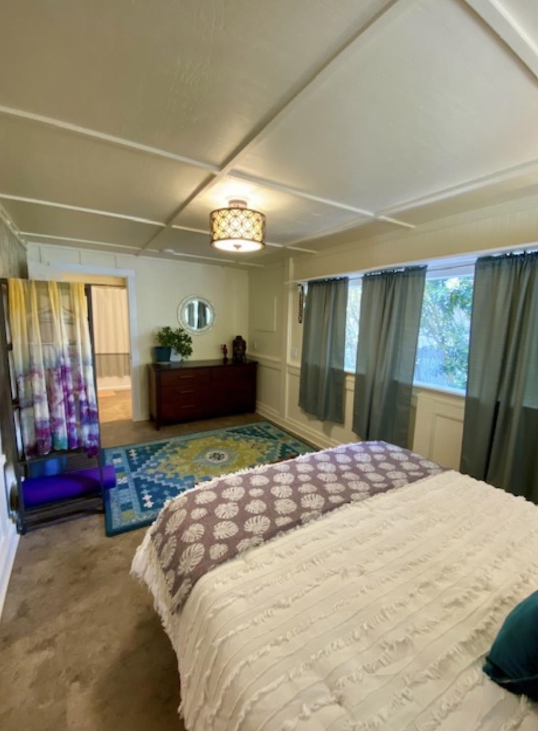 30 Olinda Road Makawao, HI 96768 - Photo 11 of 30 a bedroom with a large bed and windows