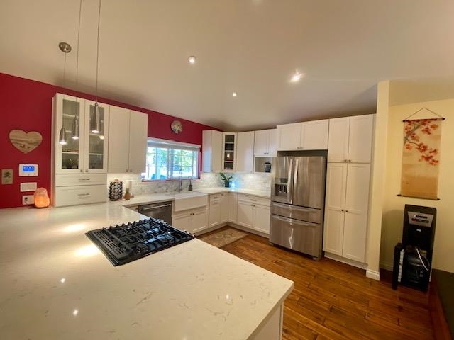 30 Olinda Road Makawao, HI 96768 - Photo 2 of 30 a kitchen with refrigerator and cabinets