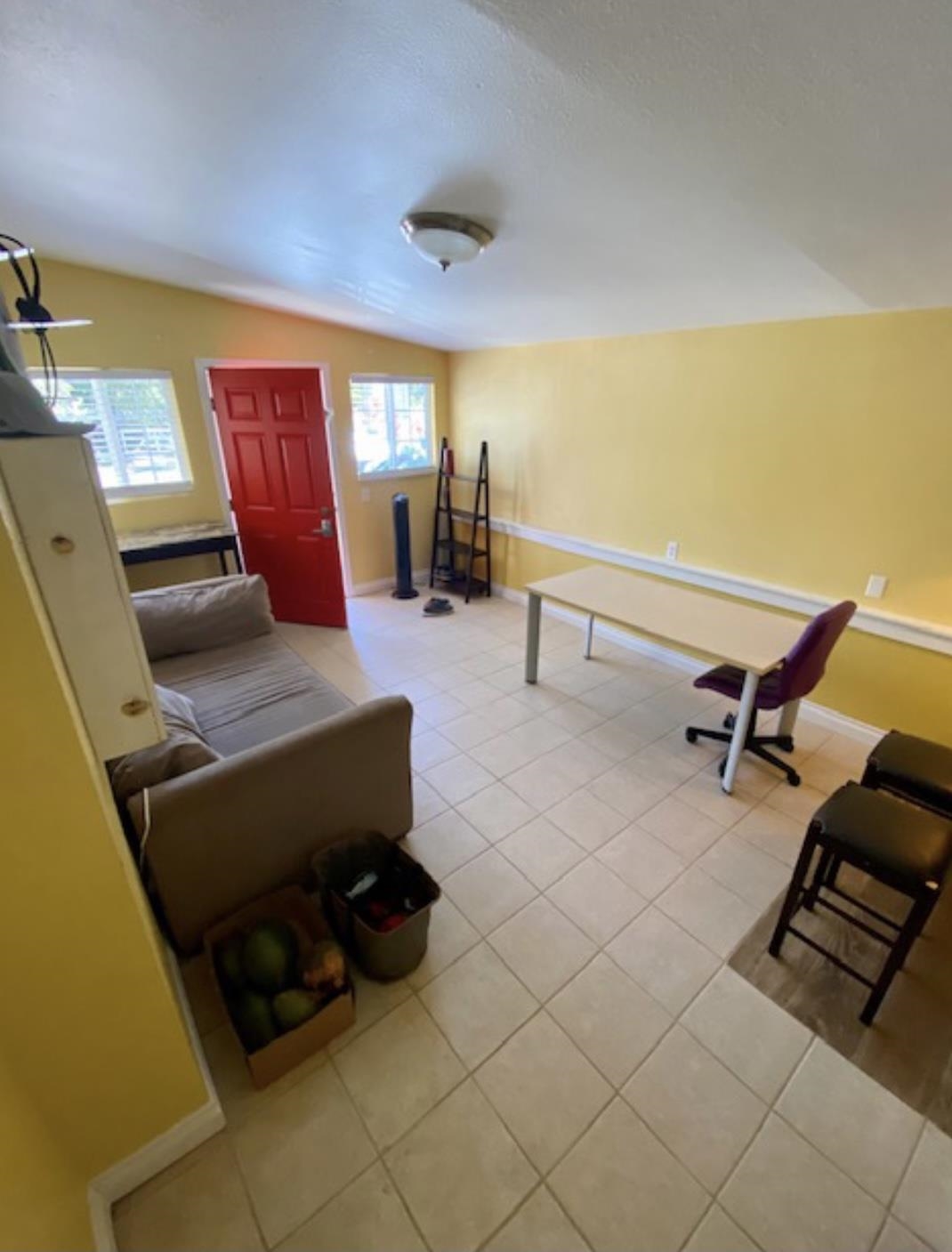 30 Olinda Road Makawao, HI 96768 - Photo 22 of 30 a living room with furniture and a flat screen tv