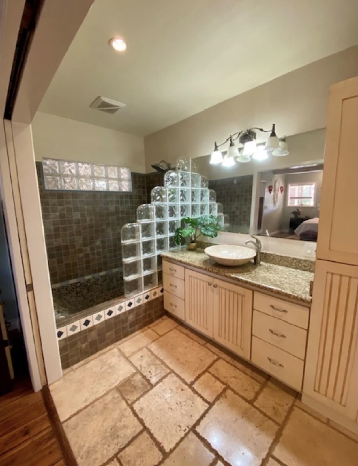30 Olinda Road Makawao, HI 96768 - Photo 7 of 30 a bathroom with a double vanity sink mirror and shower