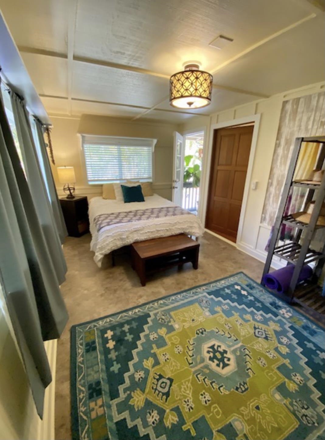 30 Olinda Road Makawao, HI 96768 - Photo 10 of 30 a bedroom with a bed dresser and a window