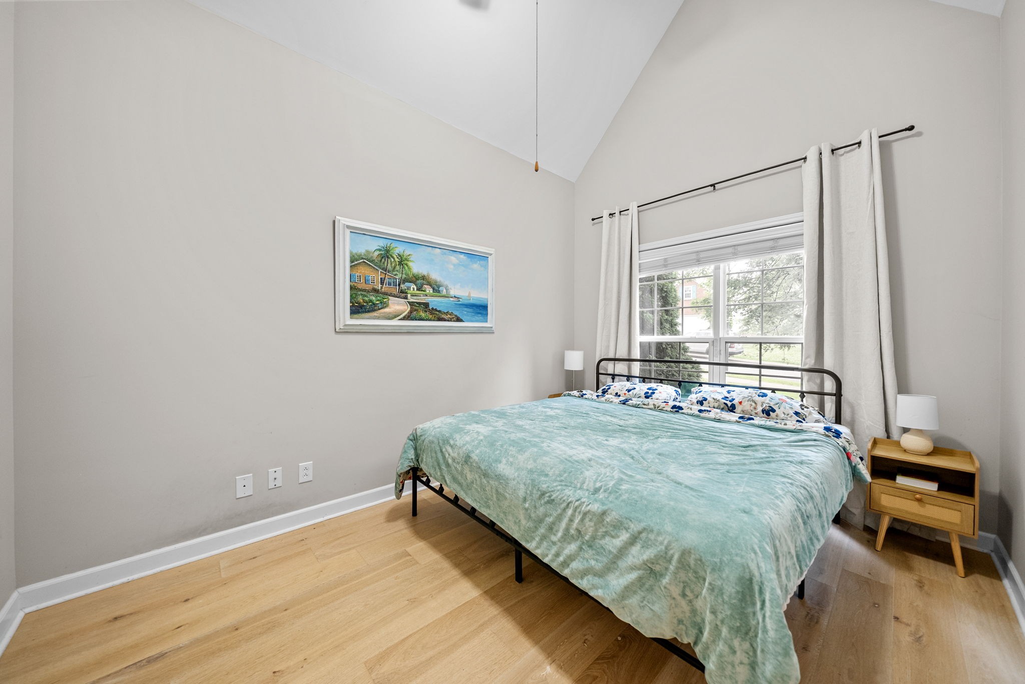 1161 Cynthia Lane Spring Hill, TN 37174 - Photo 25 of 42 a bed sitting in a bedroom next to a window