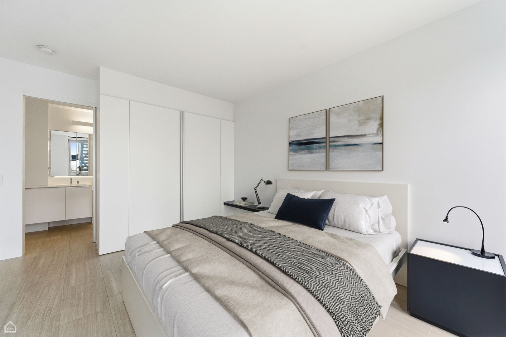 880 North Lake Shore Drive, Unit 22F Chicago, IL 60611 - Photo 15 of 21 a bedroom with a bed and a painting