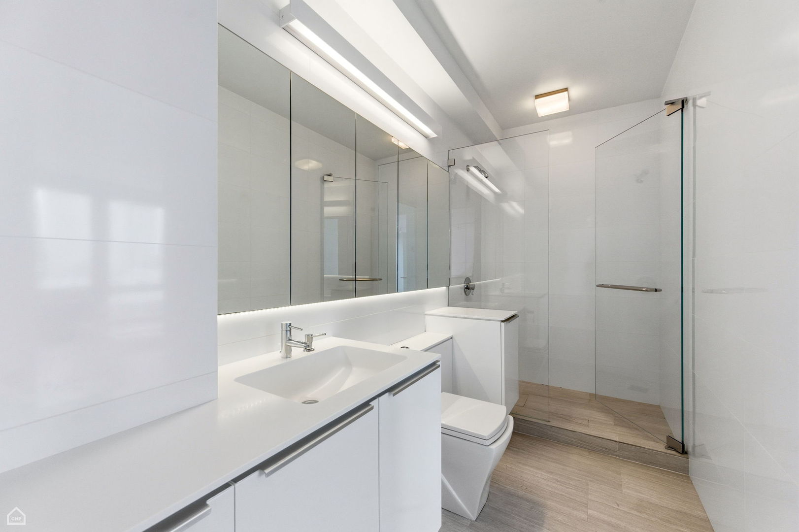 880 North Lake Shore Drive, Unit 22F Chicago, IL 60611 - Photo 16 of 21 a bathroom with a sink toilet and shower