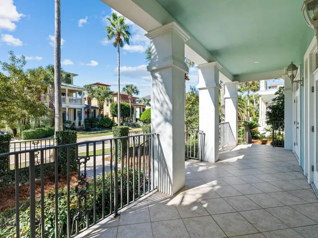 a kitchen that has a sink and a stove in it