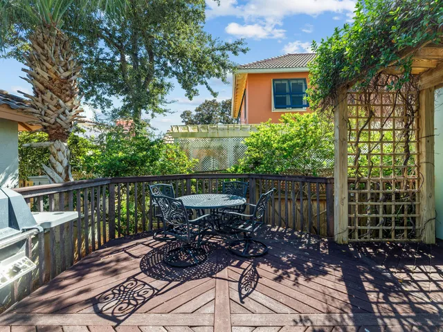 a kitchen that has a stove a sink and a refrigerator