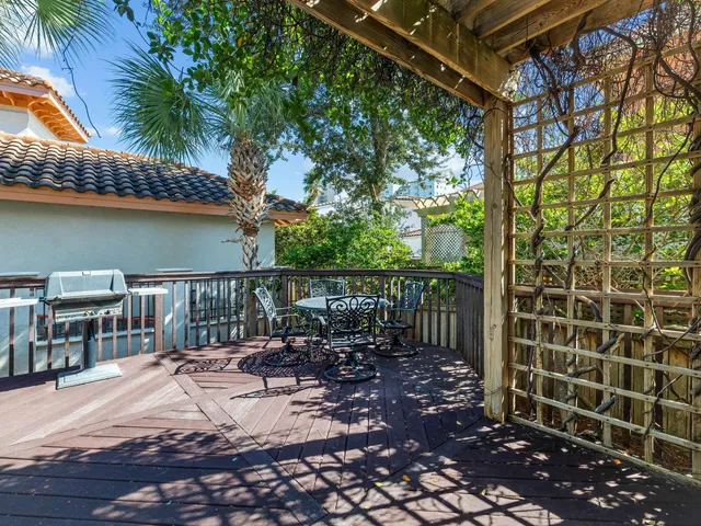 a view of a balcony with chairs