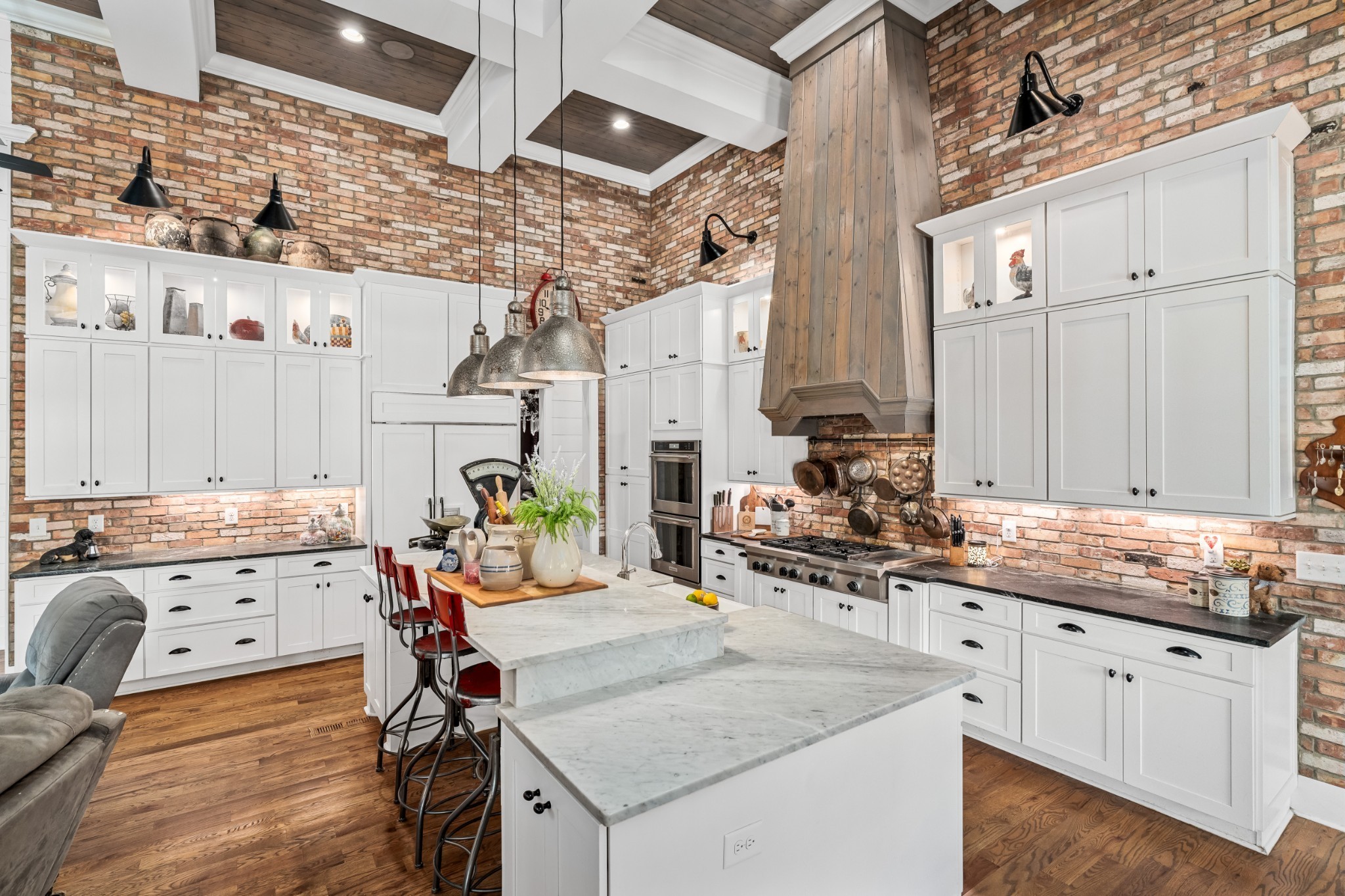 5566 Hill Road Brentwood, TN 37027 - Photo 13 of 62 a kitchen with stainless steel appliances granite countertop a sink stove and cabinets