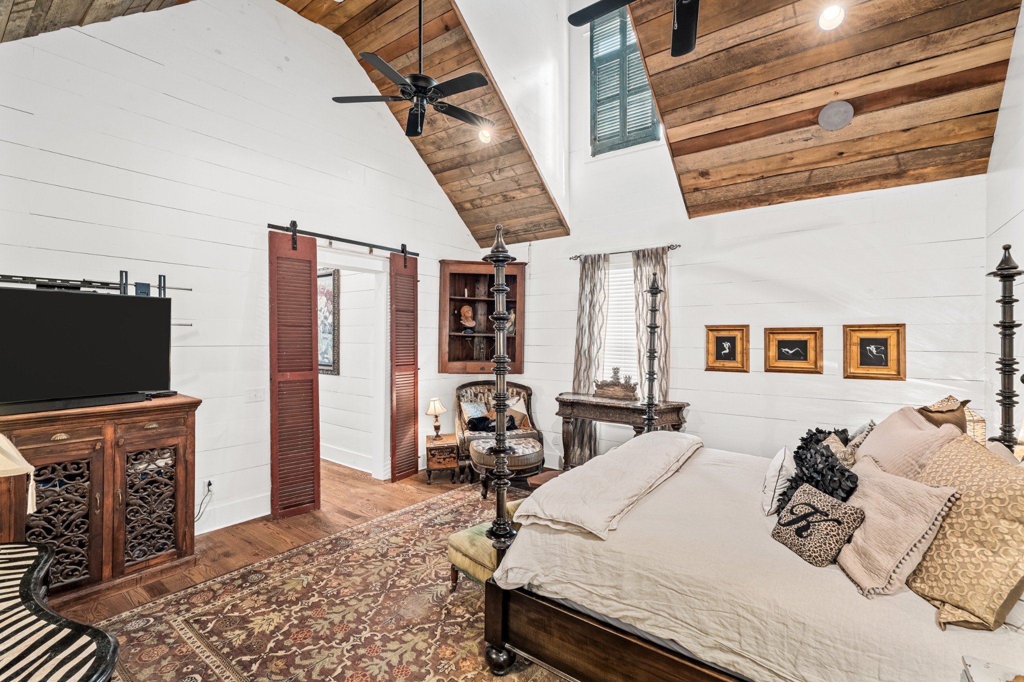 5566 Hill Road Brentwood, TN 37027 - Photo 17 of 62 a bed room with a bed and a television