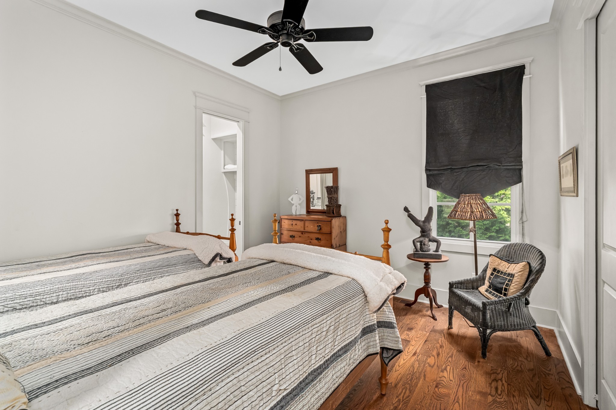 5566 Hill Road Brentwood, TN 37027 - Photo 21 of 62 a bedroom with a bed a chair and potted plant on the dresser