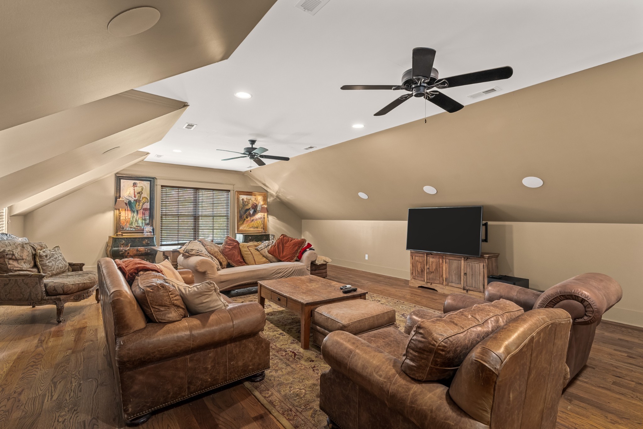 5566 Hill Road Brentwood, TN 37027 - Photo 28 of 62 a living room with furniture and a ceiling fan
