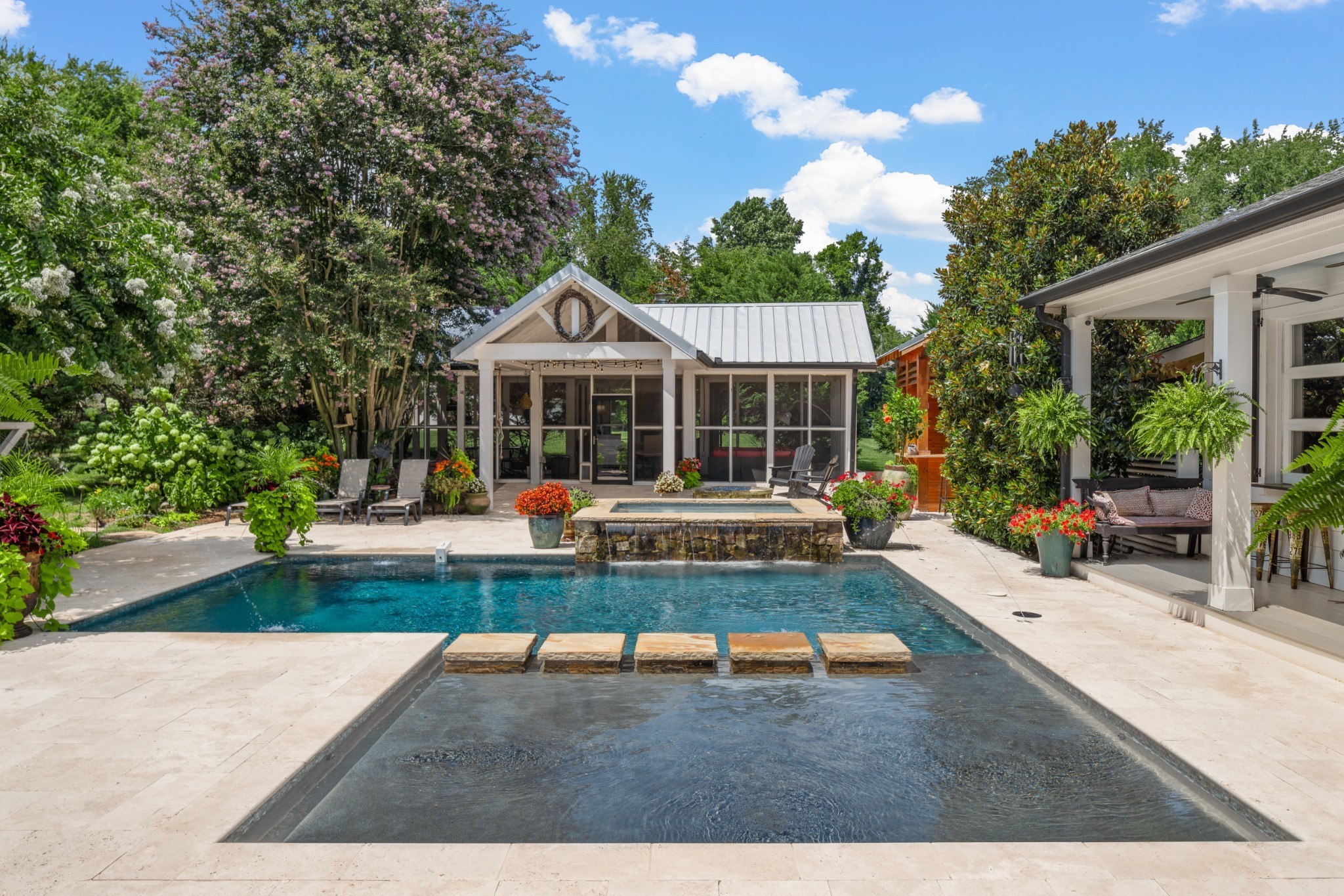 5566 Hill Road Brentwood, TN 37027 - Photo 36 of 62 a view of a house with swimming pool and sitting area