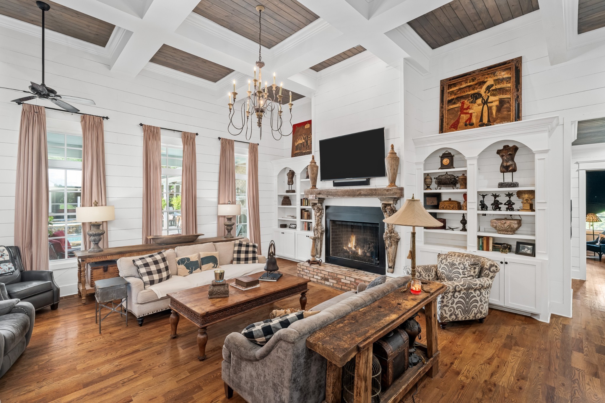 5566 Hill Road Brentwood, TN 37027 - Photo 4 of 62 a living room with fireplace furniture and a flat screen tv