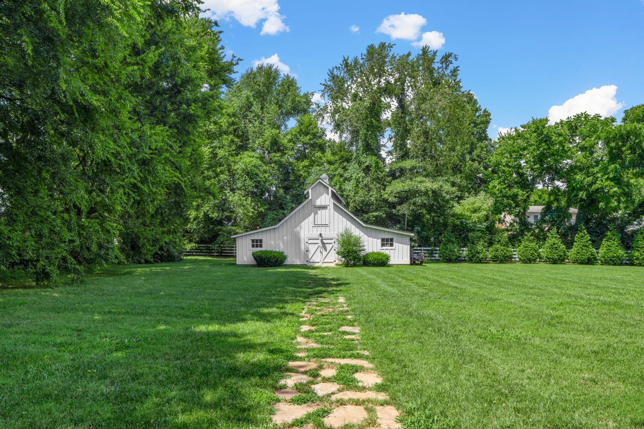 5566 Hill Road Brentwood, TN 37027 - Photo 57 of 62 a house with a tree in front of it