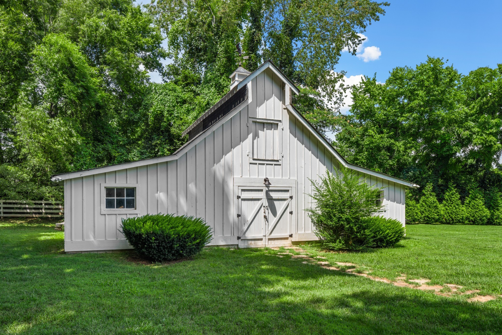 5566 Hill Road Brentwood, TN 37027 - Photo 58 of 62 a view of a house with backyard and garden