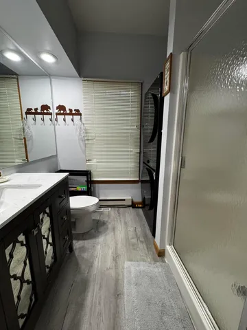 a bathroom with a sink and mirror