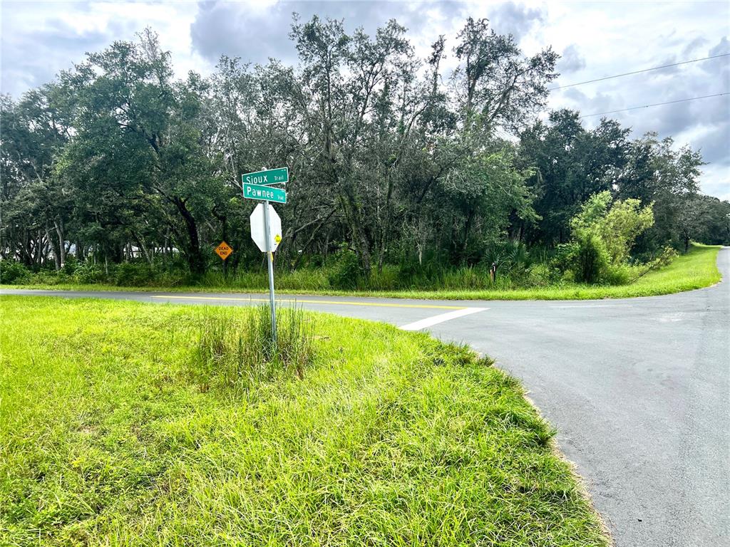Sioux Trail Davenport, FL 33896 - Photo 4 of 5 a swimming pool with outdoor seating and yard
