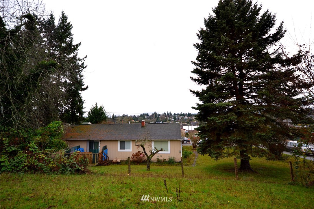 143 Sheridan Road, Unit A&B Bremerton, WA 98310 - Photo 6 of 6 a view of house with garden