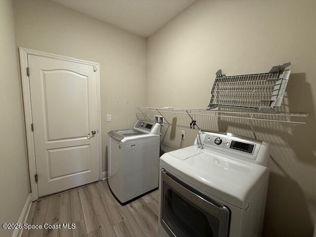 4570 Hebron Drive Merritt Island, FL 32953 - Photo 19 of 23 a utility room with dryer and washer