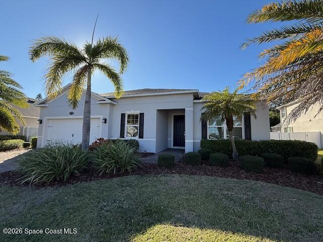 4570 Hebron Drive Merritt Island, FL 32953 - Photo 22 of 23 a front view of a house with a garden