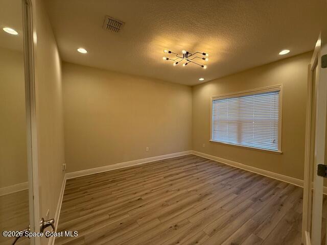 4570 Hebron Drive Merritt Island, FL 32953 - Photo 5 of 23 an empty room with a empty space and windows