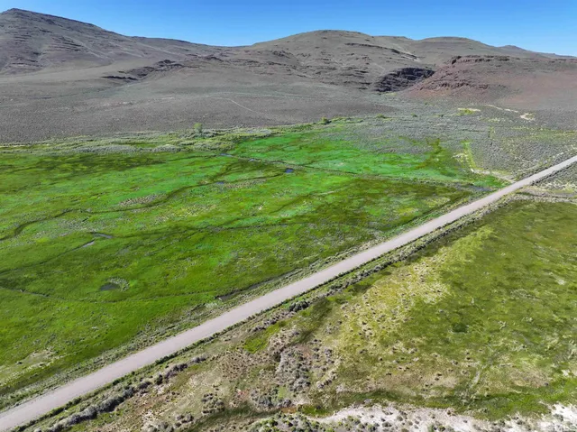 a view of a yard with an outdoor space