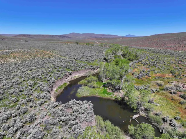 a view of a lake with a mountain