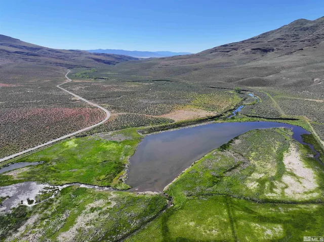 a view of a backyard with an outdoor space
