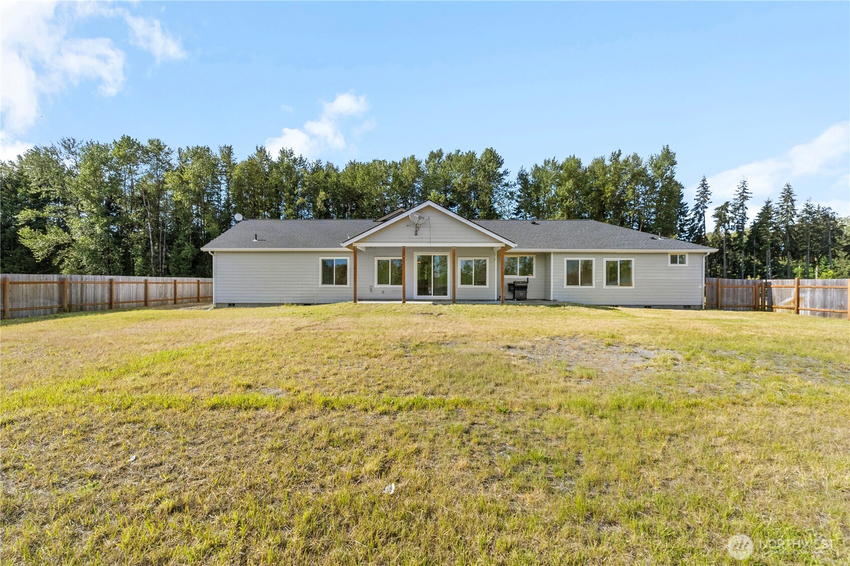 249 Flatt Road Kelso, WA 98626 - Photo 34 of 39 a front view of house with yard and trees in the background
