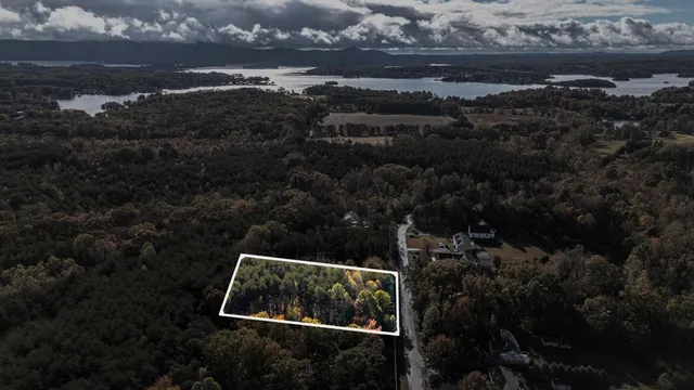 a view of roof with small yard