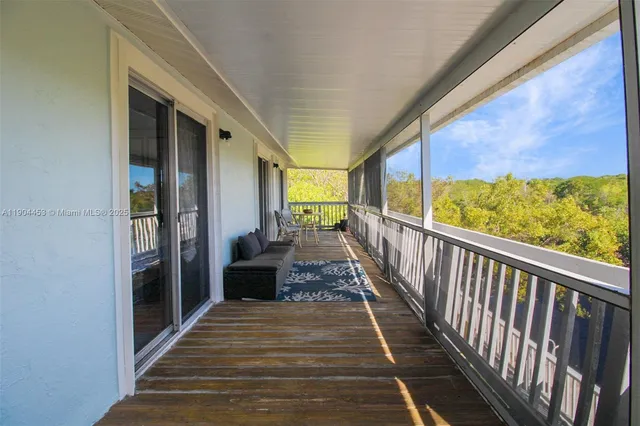 a view of a hardwood & staircase