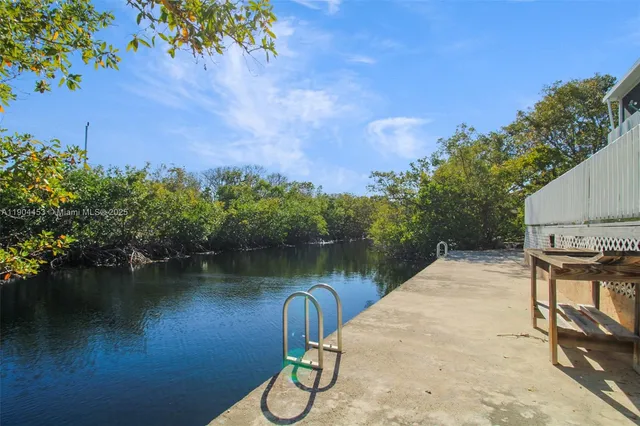 a view of a lake with a outdoor space