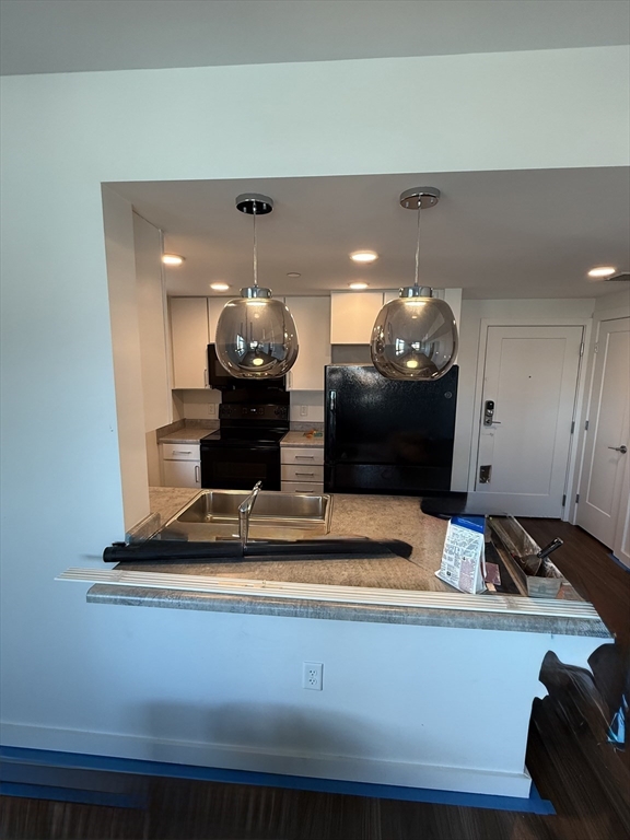 466 River Street, Unit 516 Boston, MA 02126 - Photo 2 of 16 a view of a living room with furniture