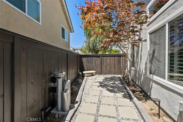 a sign broad in front of a road