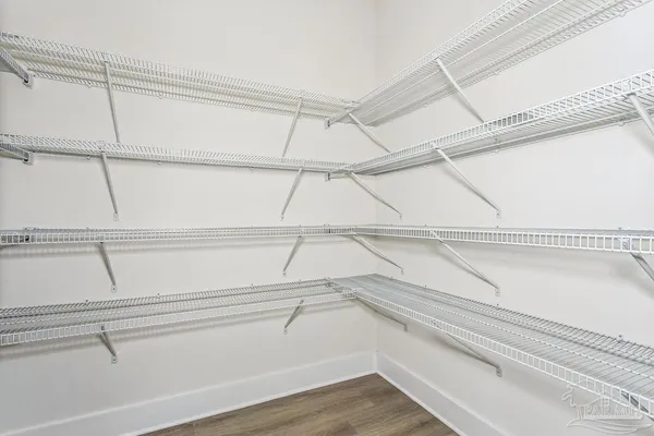 a view of a room with racks on the wall