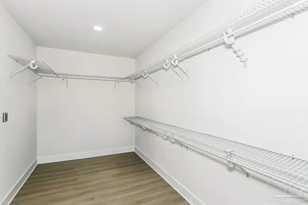 a view of a room with racks on the wall