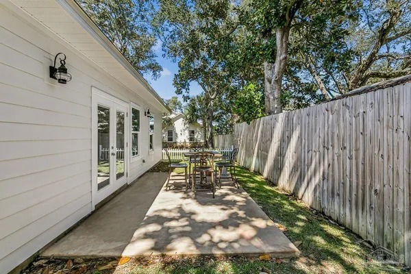 a view of outdoor sitting area with chairs