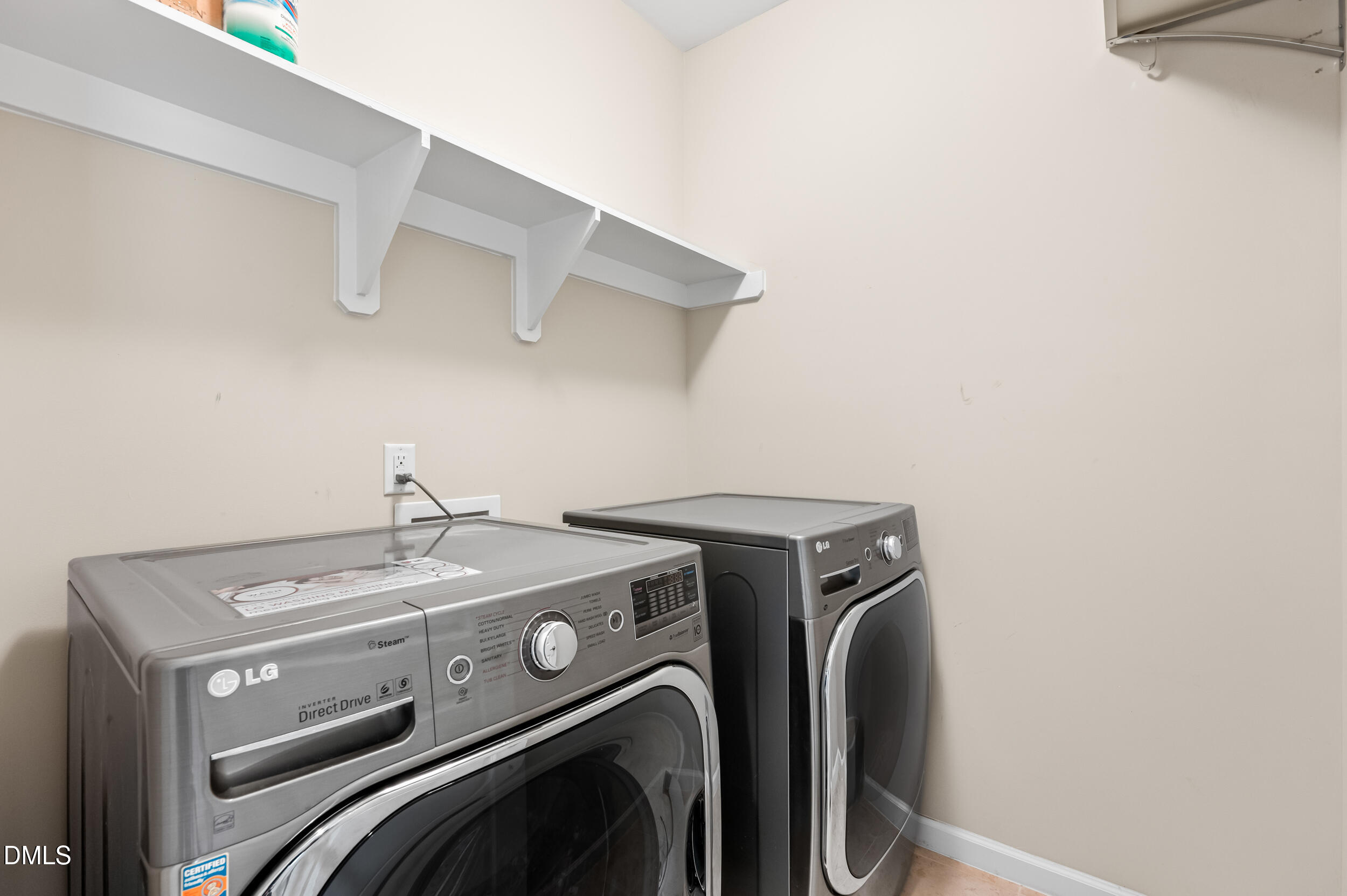 1301 Oatney Ridge Lane Morrisville, NC 27560 - Photo 23 of 38 a utility room with dryer and washer