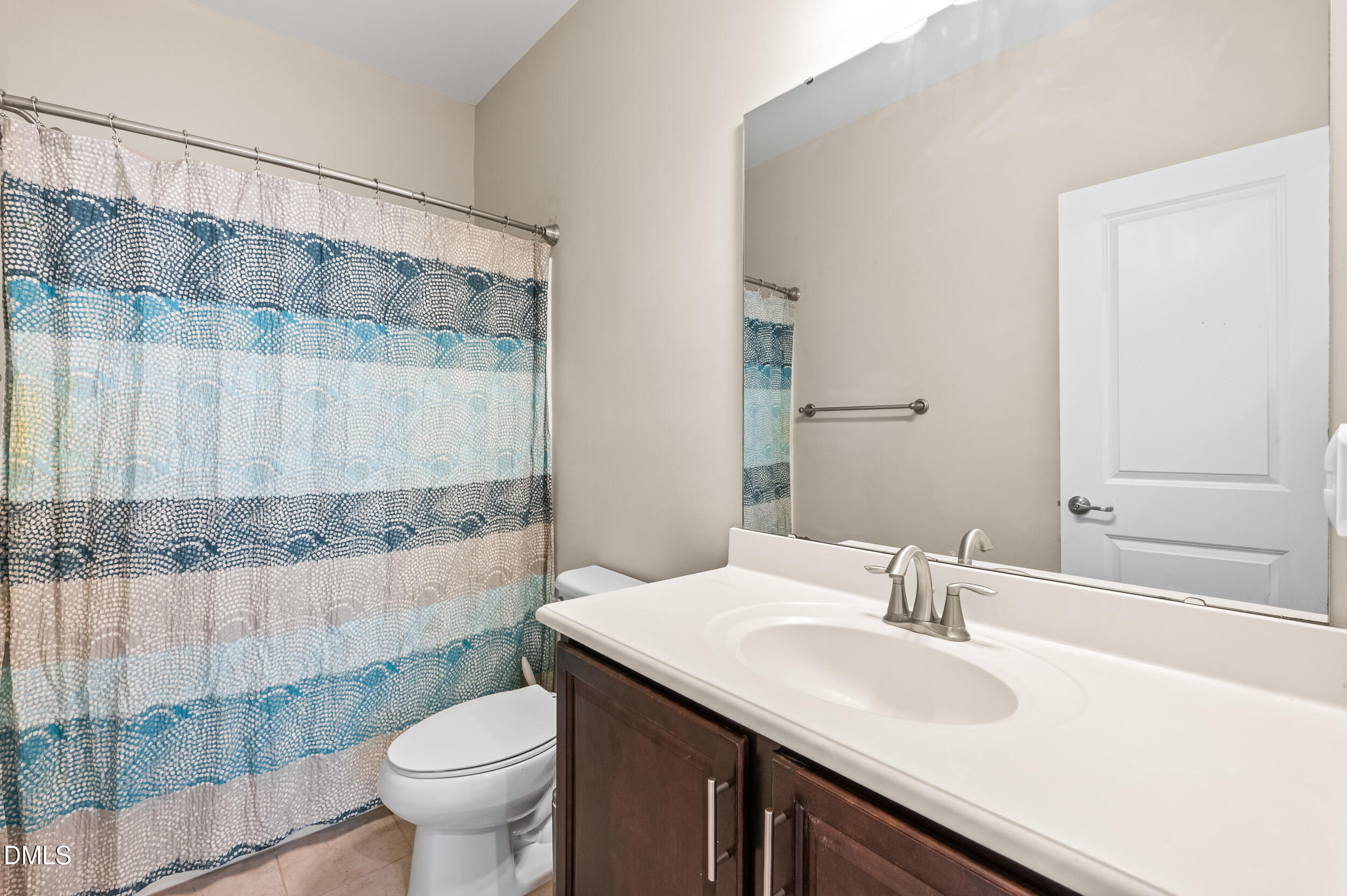 1301 Oatney Ridge Lane Morrisville, NC 27560 - Photo 26 of 38 a bathroom with a sink and a toilet