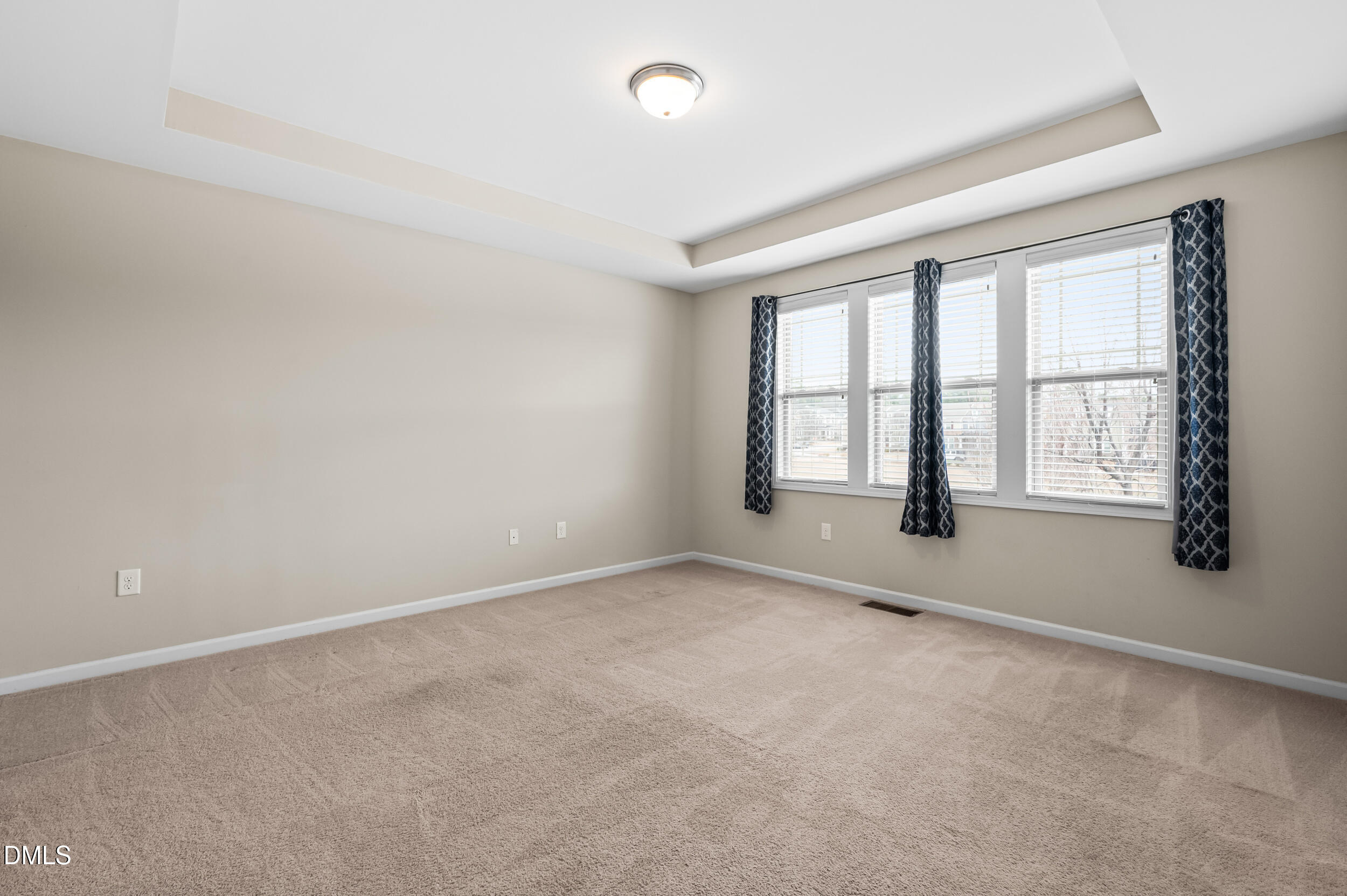 1301 Oatney Ridge Lane Morrisville, NC 27560 - Photo 27 of 38 an empty room with windows