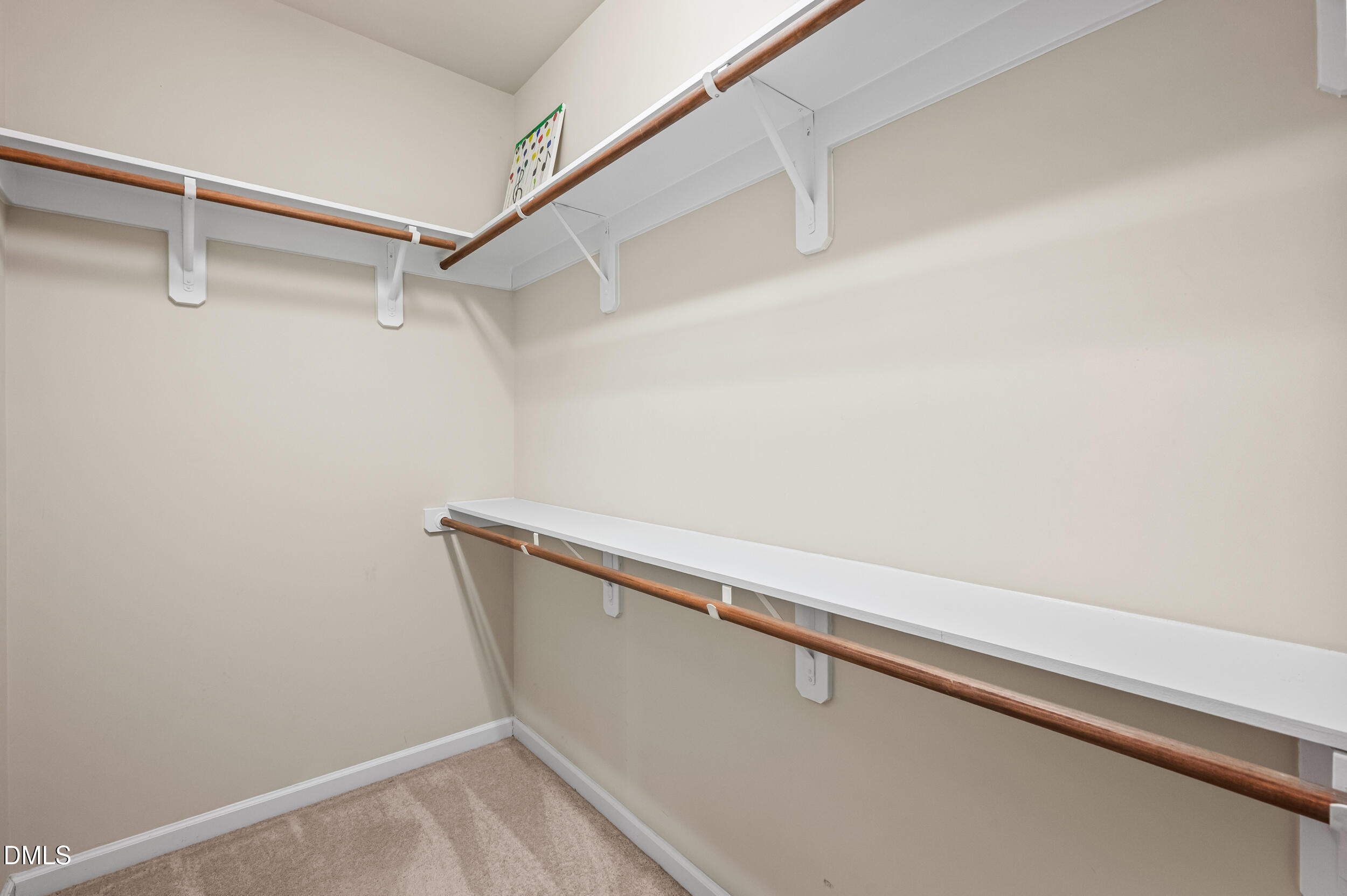 1301 Oatney Ridge Lane Morrisville, NC 27560 - Photo 29 of 38 a view of small space with racks on the wall