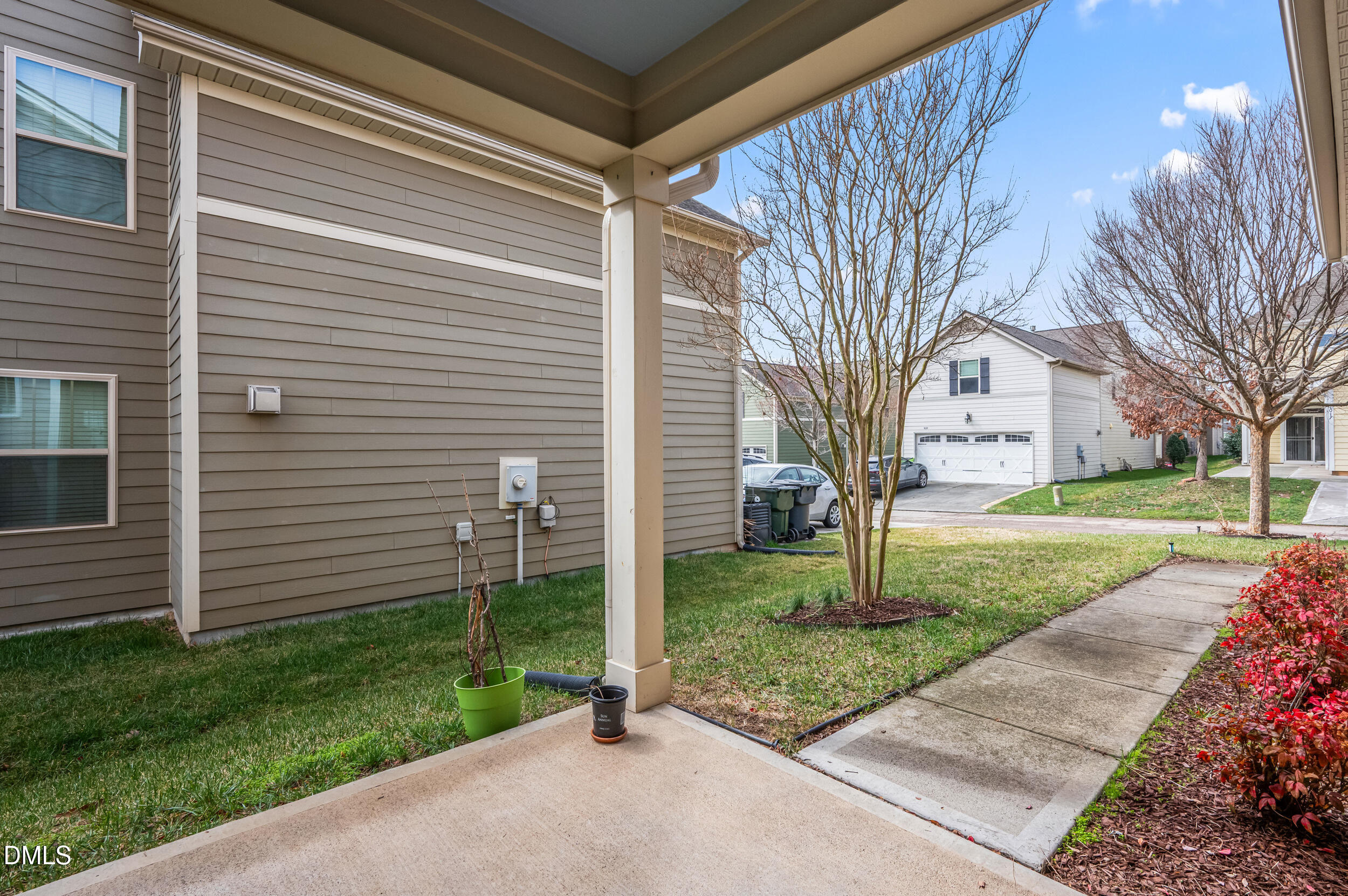 1301 Oatney Ridge Lane Morrisville, NC 27560 - Photo 33 of 38 a view of a house with a yard