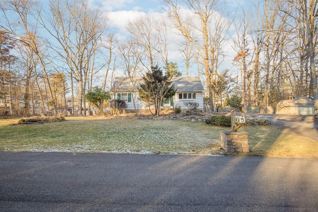 View of front of home featuring a front lawn