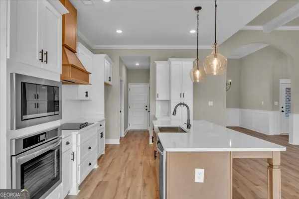 a bathroom with a tub and a shower