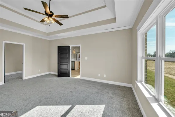 a bathroom with double vanity sinks and a mirror