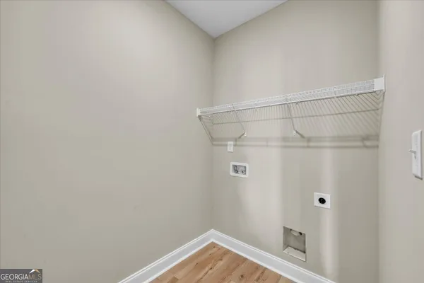 a bathroom with a bathtub and toilet