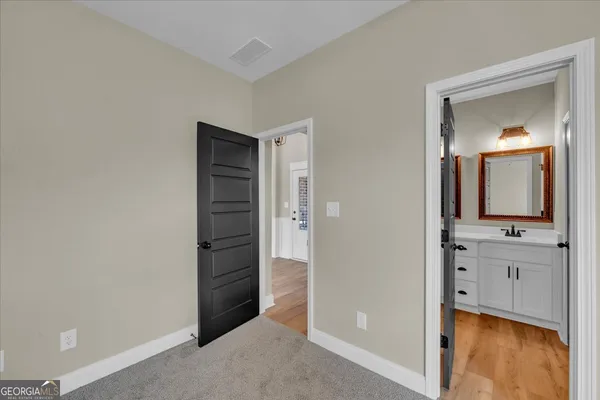 a house with trees in the background