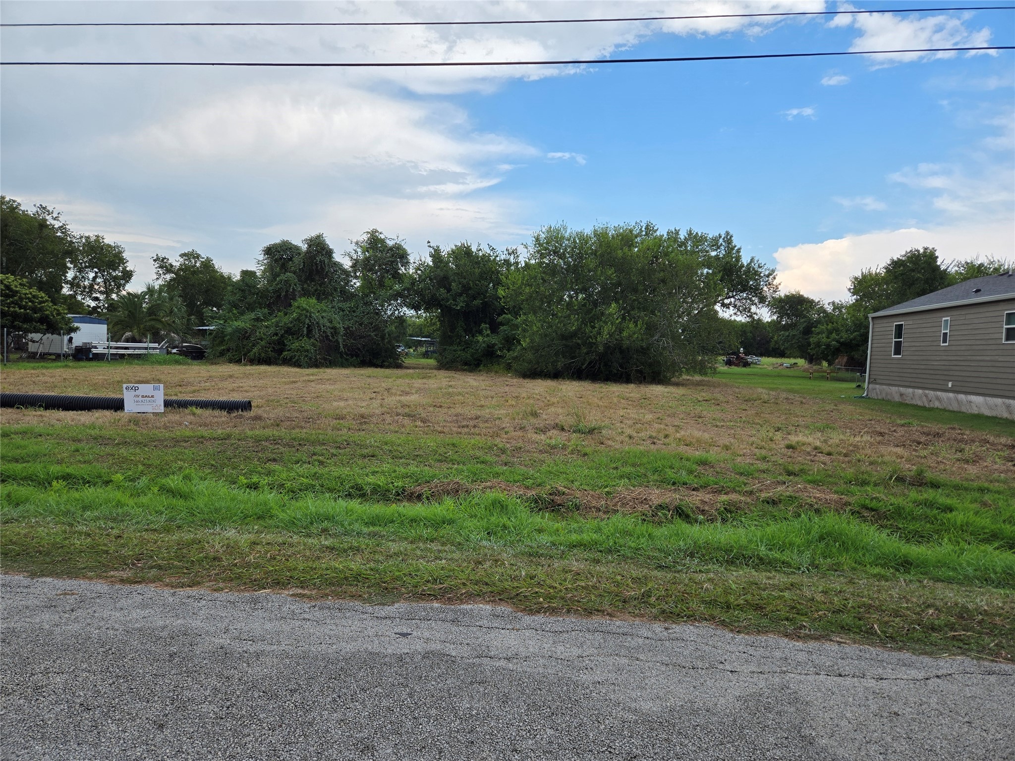 0 Peabody Street Edna, TX 77957 - Photo 4 of 7 a view of outdoor space with green field and trees
