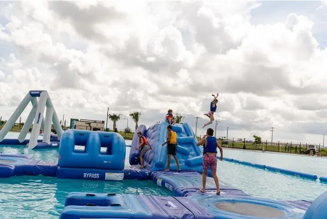 an aerial view of a house with outdoor space